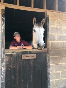 Horse (Moomin) and her owner (Jayne Hunt) leaning over a stable door